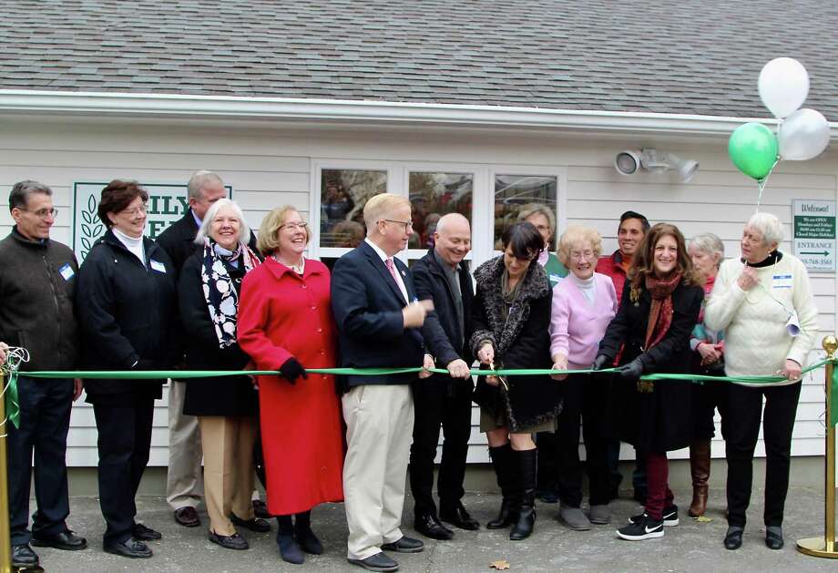 Daily Bread Food Pantry’s dedication and ribbon cutting ceremony drew a crowd of about 75 supporters outside of Saint James Episcopal Church in Danbury on Nov. 14. The crowd included donors, volunteers, supporters, city and Department of Housing and Urban Development officials and Ridgefield Thrift Shop President Sandra Capriotti and Finance Committee Head Debbie Murphy. The Thrift Shop donated $10,000 for the renovation project. Speakers included Mayor Boughton, Alanna Kabel, director of community planning and development at HUD’s Hartford Field Office, and architect Leigh Overland. Photo: Contributed Photo