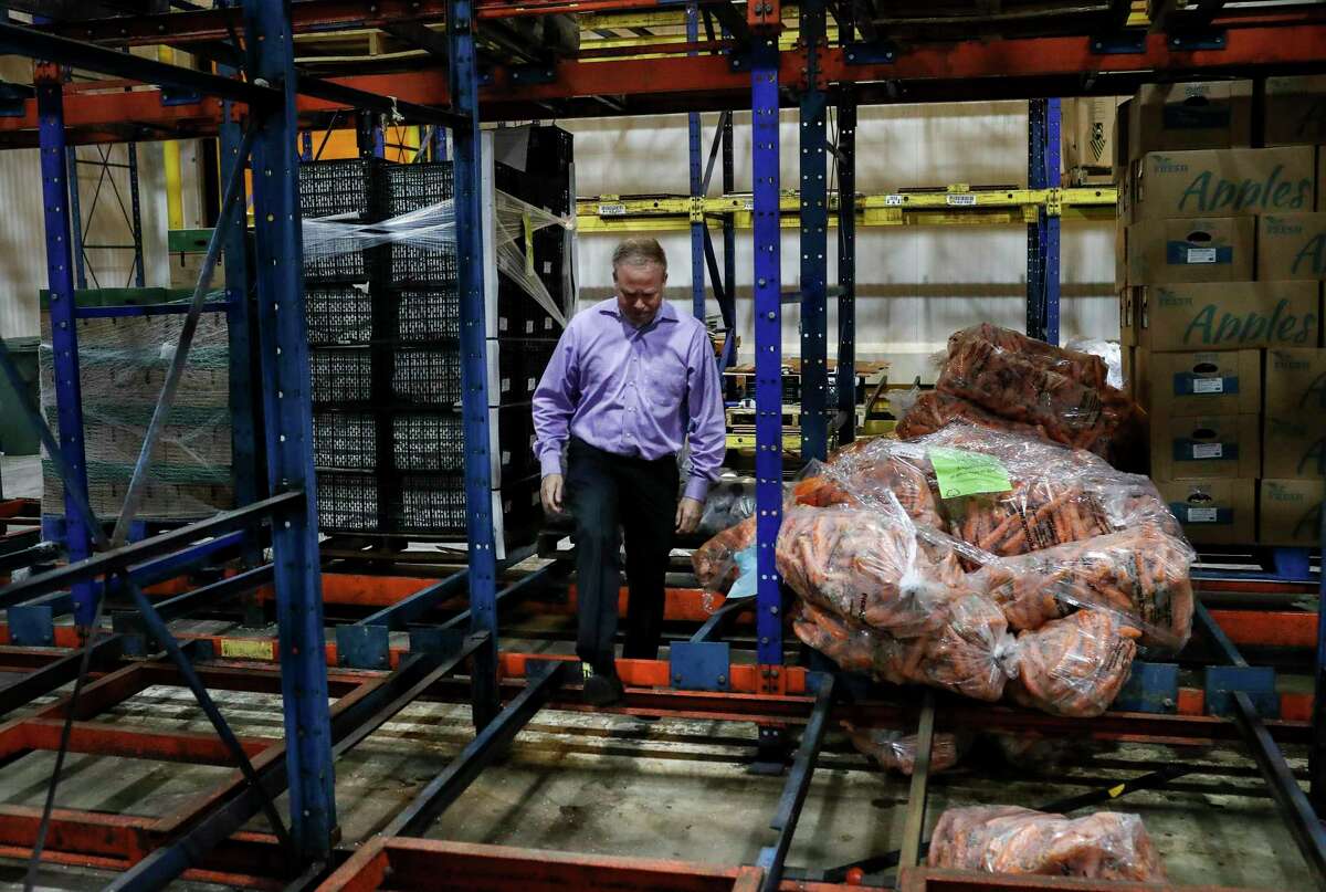 "What a tragedy, what a waste," said Matt Toomes, chief operating officer of the Houston Food Bank, on Tuesday, Nov. 19, 2019, in Houston. The food bank lost 1.8 million pounds of food, including produce, when a malfunction with a cooling unit caused an ammonia leak in three of the center's refrigeration areas last week. "This is one of the busiest times of the year for us," he said.
