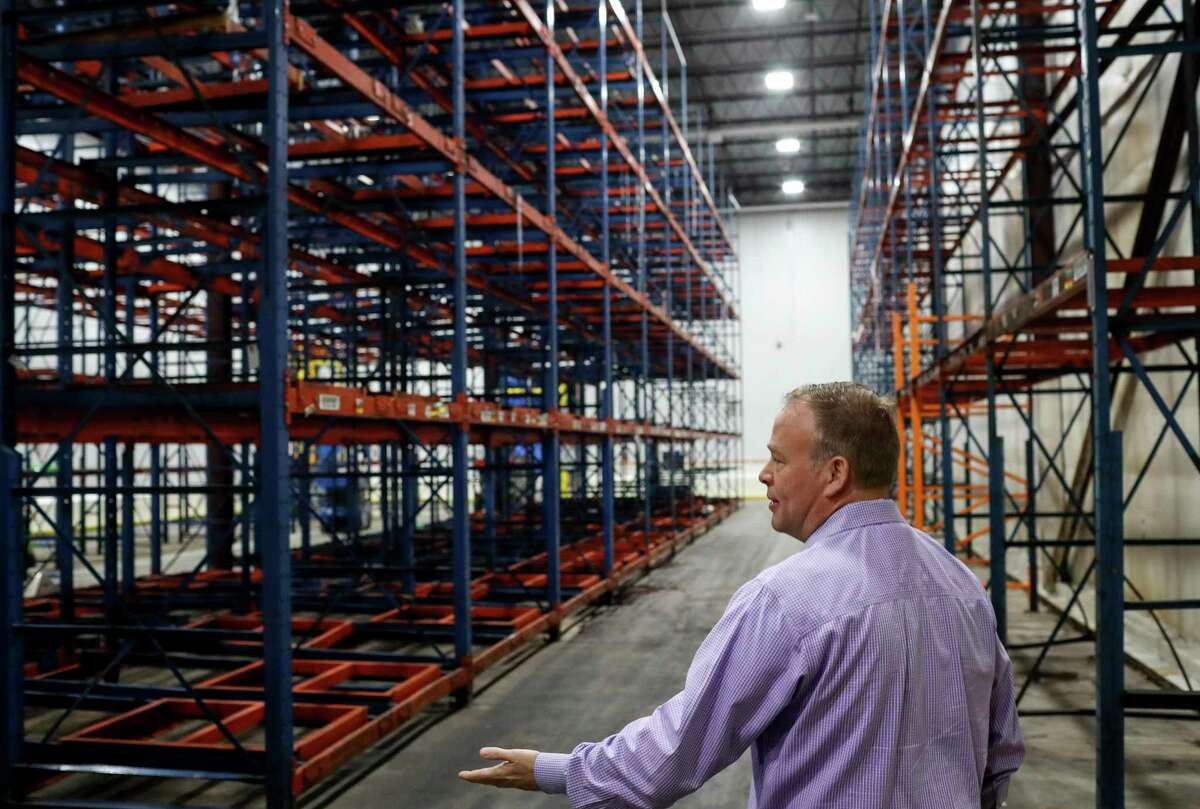 Matt Toomes, chief operating officer of the Houston Food Bank, gives a tour of one of the center's refrigeration areas on Tuesday, Nov. 19, 2019, in Houston. The food bank lost 1.8 million pounds of food, including produce, when a malfunction with a cooling unit caused an ammonia leak in three of the center's refrigeration areas. "What a tragedy, what a waste," he said.