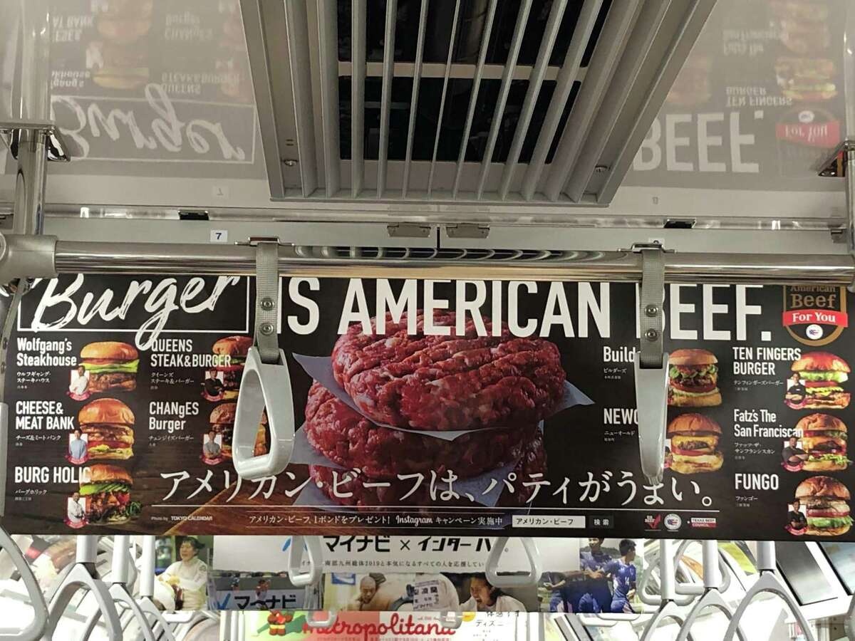 A poster inside a Tokyo subway car promoting American beef. The Beef Promotion and Research Act created a program to help American cattlemen sell more overseas. The livestock industry is now fighting for a law that would it illegal to call anything but a beef patty a burger.