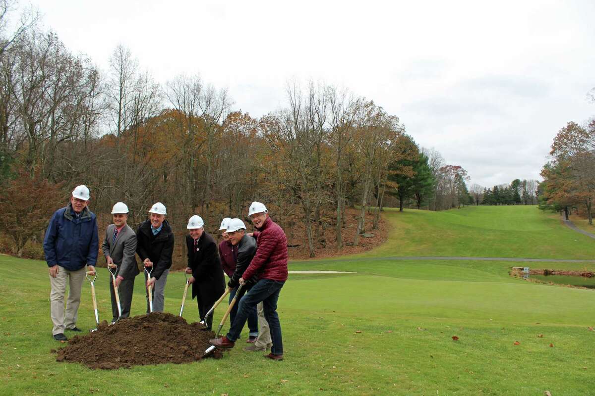 Town officials and building committee members broke ground at H. Smith Richardson golf course Wednesday.