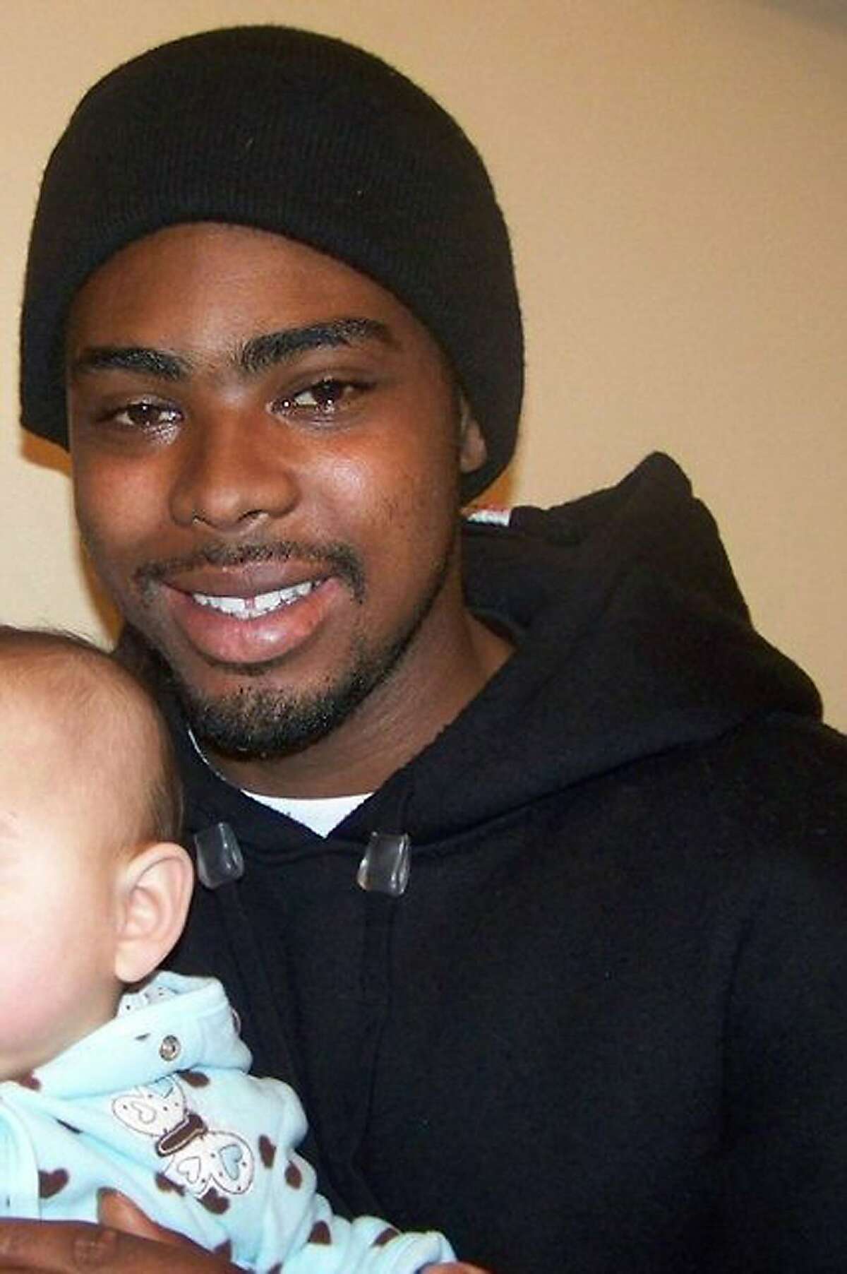 This undated family photo provided by the Law Offices of John Burris shows Oscar Grant, a 22-year-old transit rider who was shot and killed by BART police on New Year's Day 2009.
