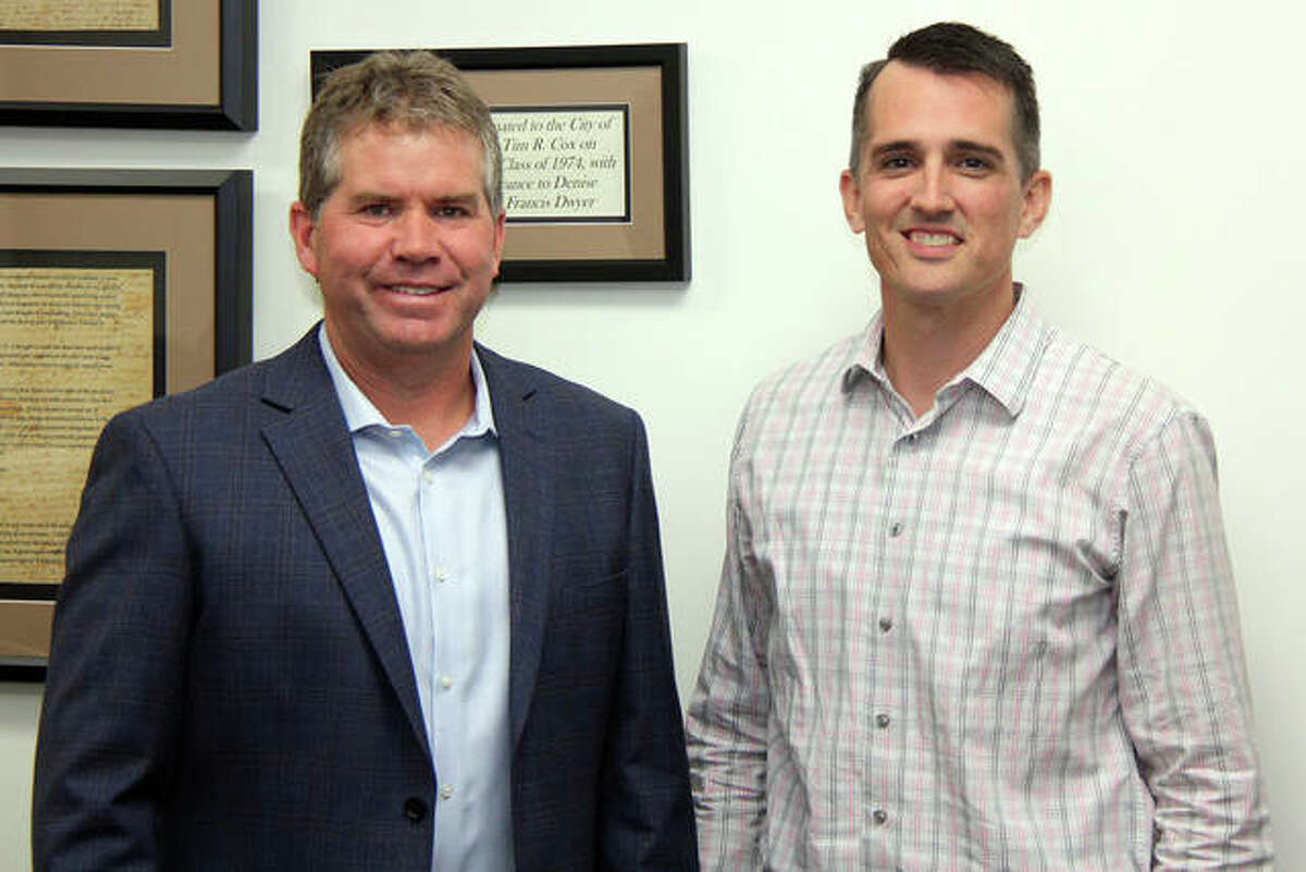 Nate Tingley, right, is the city’s new parks director. With Tingley is Mayor Hal Patton, moments after Tingley was approved for the position. Tingley will replace Bob Pfeiffer, who will retire in early December after almost 45 years with the city.