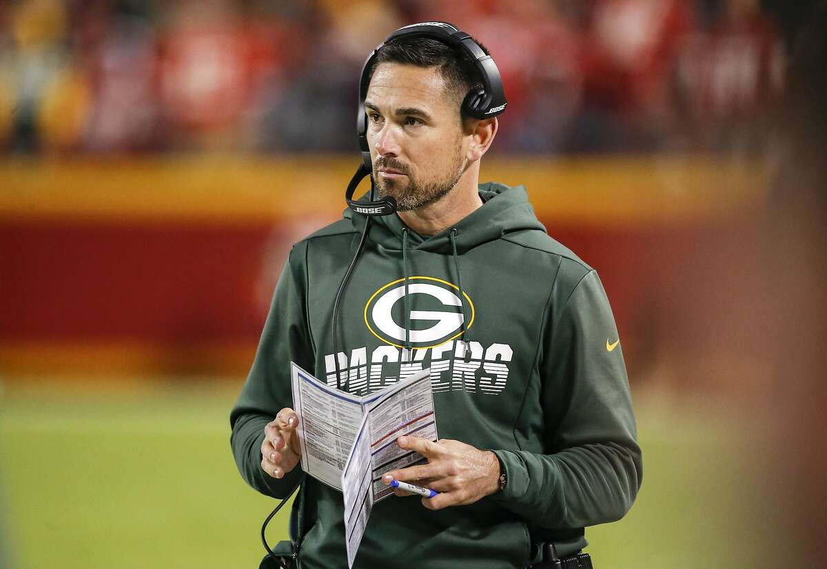 Matt LaFleur watches the game action from the sideline.