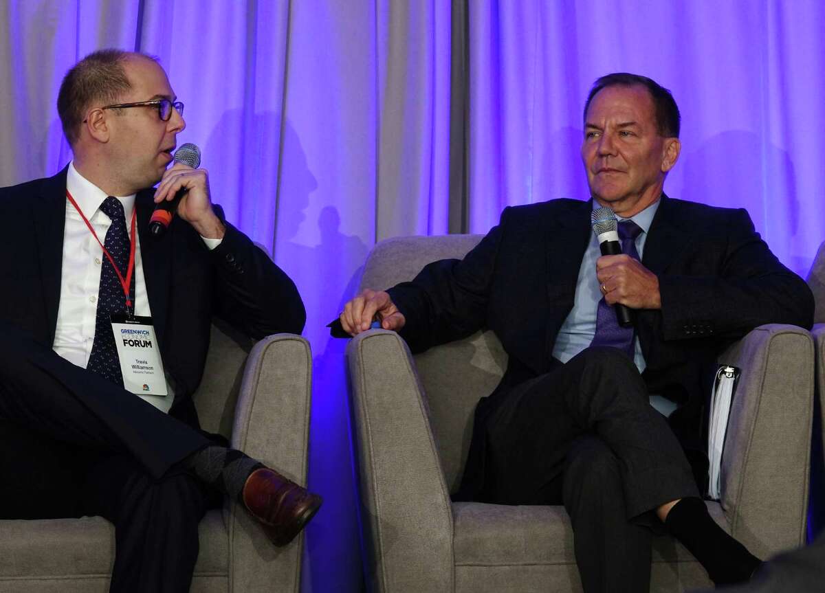 Tudor Investment Corp. founder Paul Tudor Jones II, right, is interviewed by Albourne America Partner Travis Williamson during day one of the Greenwich Economic Forum at the Delamar Greenwich Harbor in Greenwich, Conn. Thursday, Nov. 15, 2018. The two day event "brings together 300+ of the world’s leading minds in finance and public policy to discuss and debate the global risk environment." Greenwich billionaires Ray Dalio, of Bridgewater Associates, and Paul Tudor Jones, of Tudor Investment Corp., were featured speakers at the event.