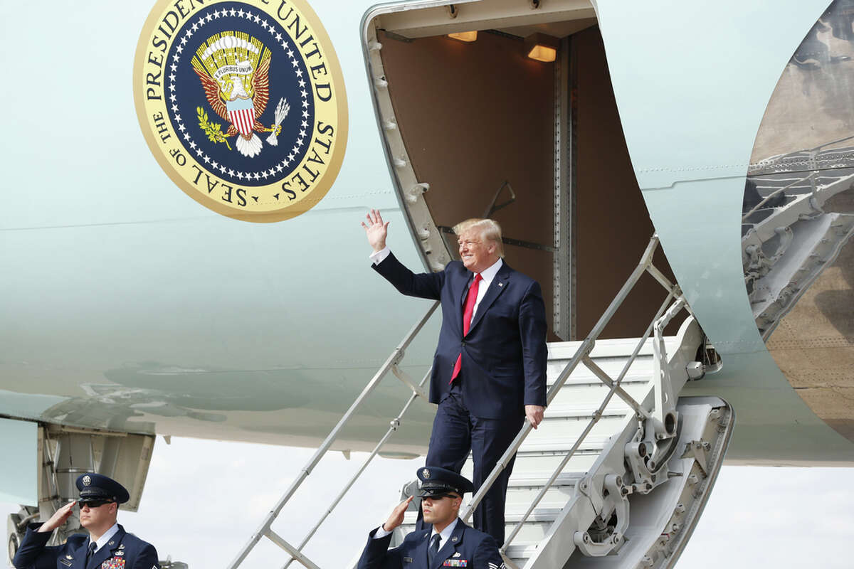 President Donald Trump exits Airforce One at Austin Bergstrom International Airport for a short visit to Austin's Apple campus November 20, 2019. JAY JANNER/AMERICAN-STATESMAN