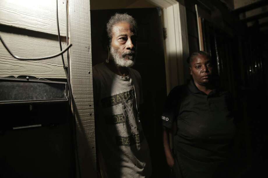 Sherman and Michelle Brooks outside their apartment in Houston. Members of the Houston Police Department’s narcotics division busted down the door of their home, apartment No. 1, looking for a drug suspect. But the suspect, who was arrested six months later, actually lived nextdoor in apartment No. 2. Photo: Elizabeth Conley,  Staff Photographer / © 2018 Houston Chronicle