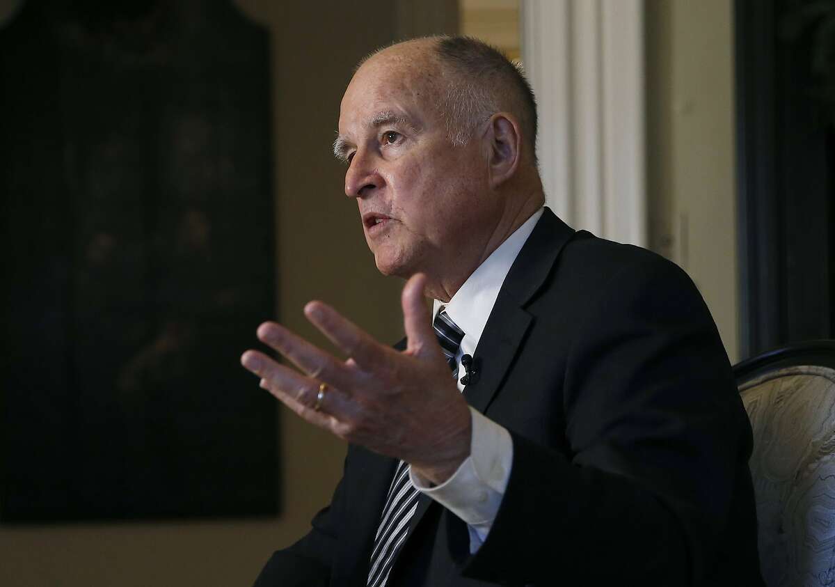 FILE - In this Tuesday, Dec. 18, 2018 file photo, then California Gov. Jerry Brown talks during an interview in Sacramento, Calif. California's first-in-the-nation law requiring publicly held companies to put women on their boards of directors faces its second legal challenge. Pacific Legal Foundation sued in federal court on Wednesday, Nov. 13, 2019, arguing that the law violates the U.S. Constitution's equal protection clause. (AP Photo/Rich Pedroncelli, File)