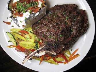 Review Conroy S Bar Grill Gets A Global Buzz Going At Its Stone Oak Restaurant