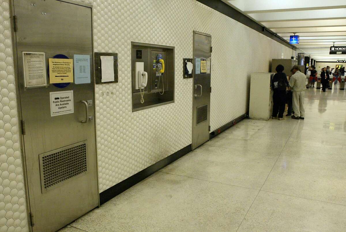 Event on 6/26/04 in San Francisco. the closed BART bathrooms at the Powell street station in SF,and the signs on the doors.