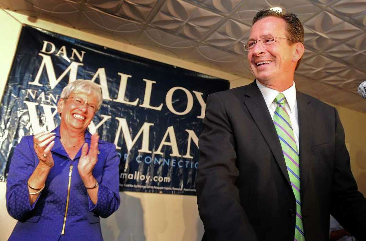 Former Stamford Mayor Dan Malloy and running mate Nancy Wyman celebrate their victory in the Democratic gubernatorial primary Tuesday August 10, 2010 at City Steam Brewery Cafe in Hartford.