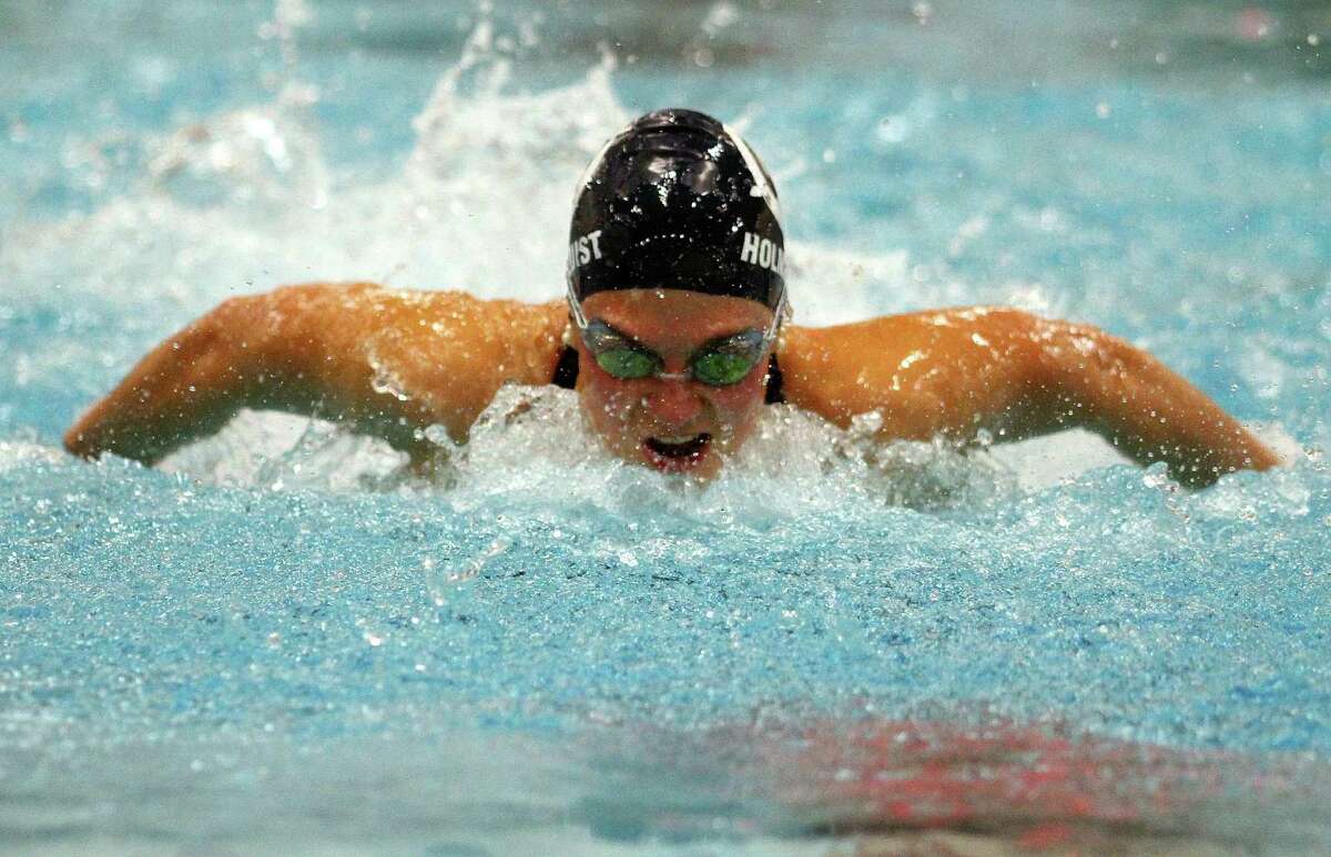 Wilton's Ellen Holmquist competes in the 200 IM during girls swimming action in Middletown, Conn., on Wednesday Nov. 20, 2019.