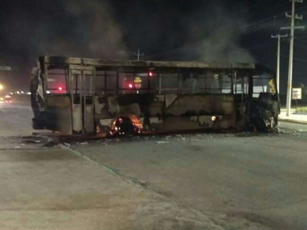 Burning vehicles were used to block main roads Friday during attacks in Nuevo Laredo.