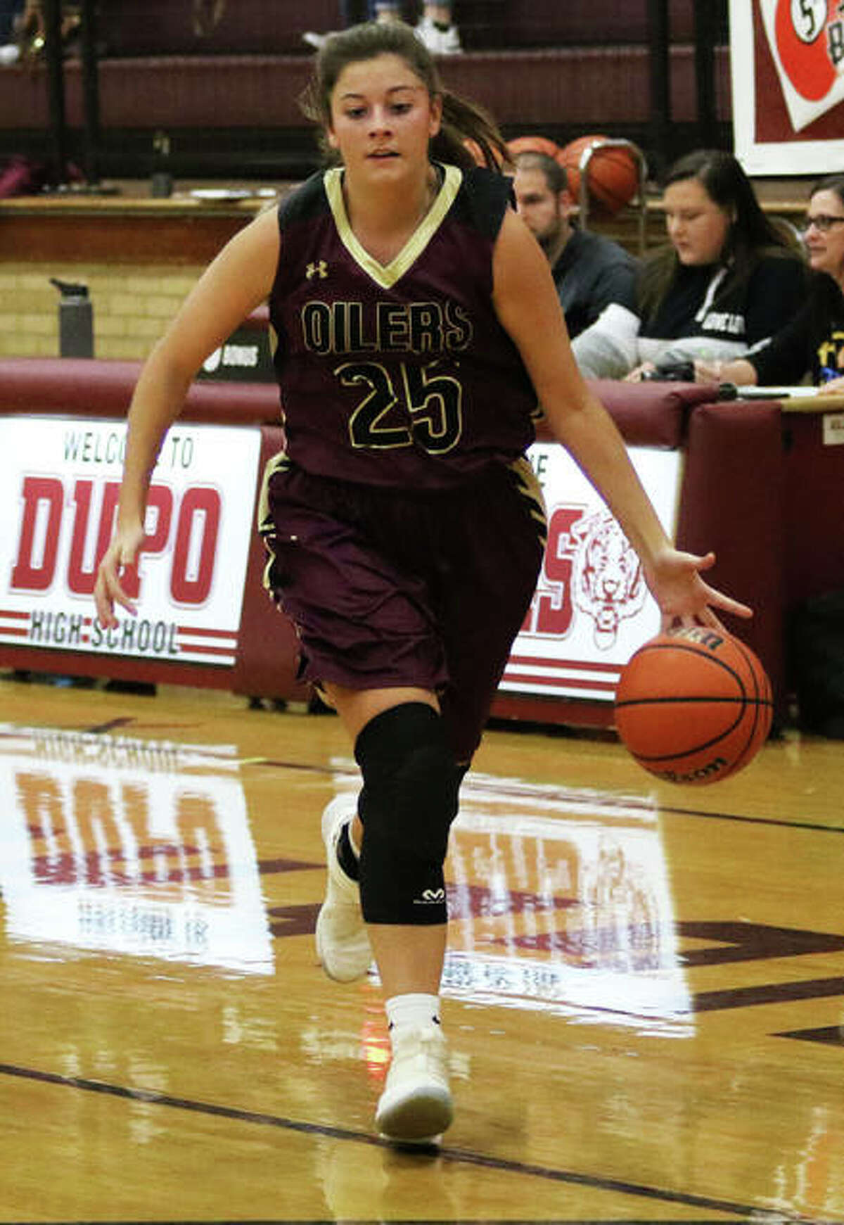 EA-WR’s Hannah Allen, shown pushing the ball upcourt in Tuesday’s win over Roxana, scored 11 points on Thursday night to lead the Oilers to a semifinal win over Dupo in the Cat Classic in Dupo.