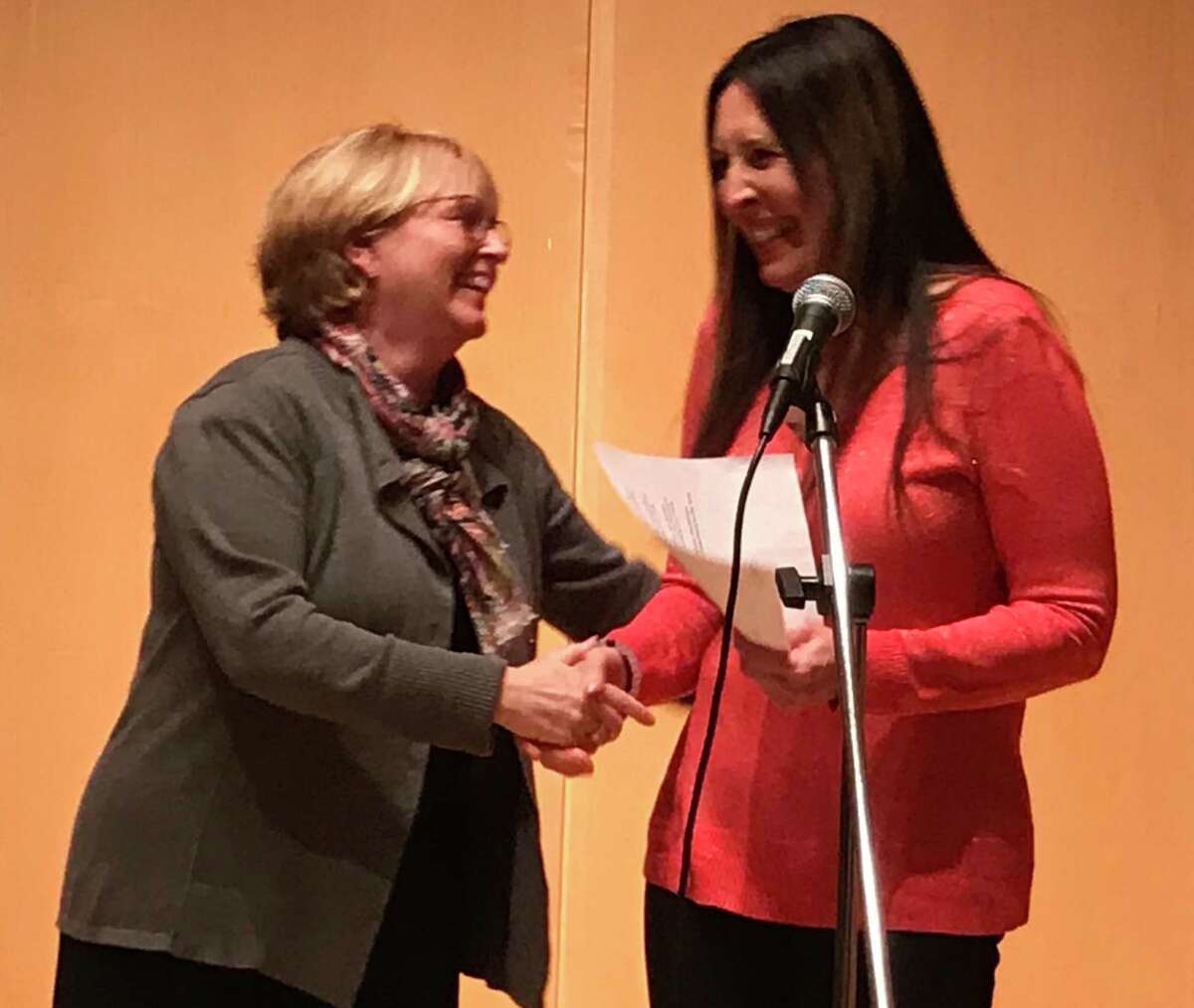 Town Clerk Lori Kabak, right, congratulates First Selectwoman Lynne Vanderslice at Wilton's swearing-in ceremony on Nov. 21.