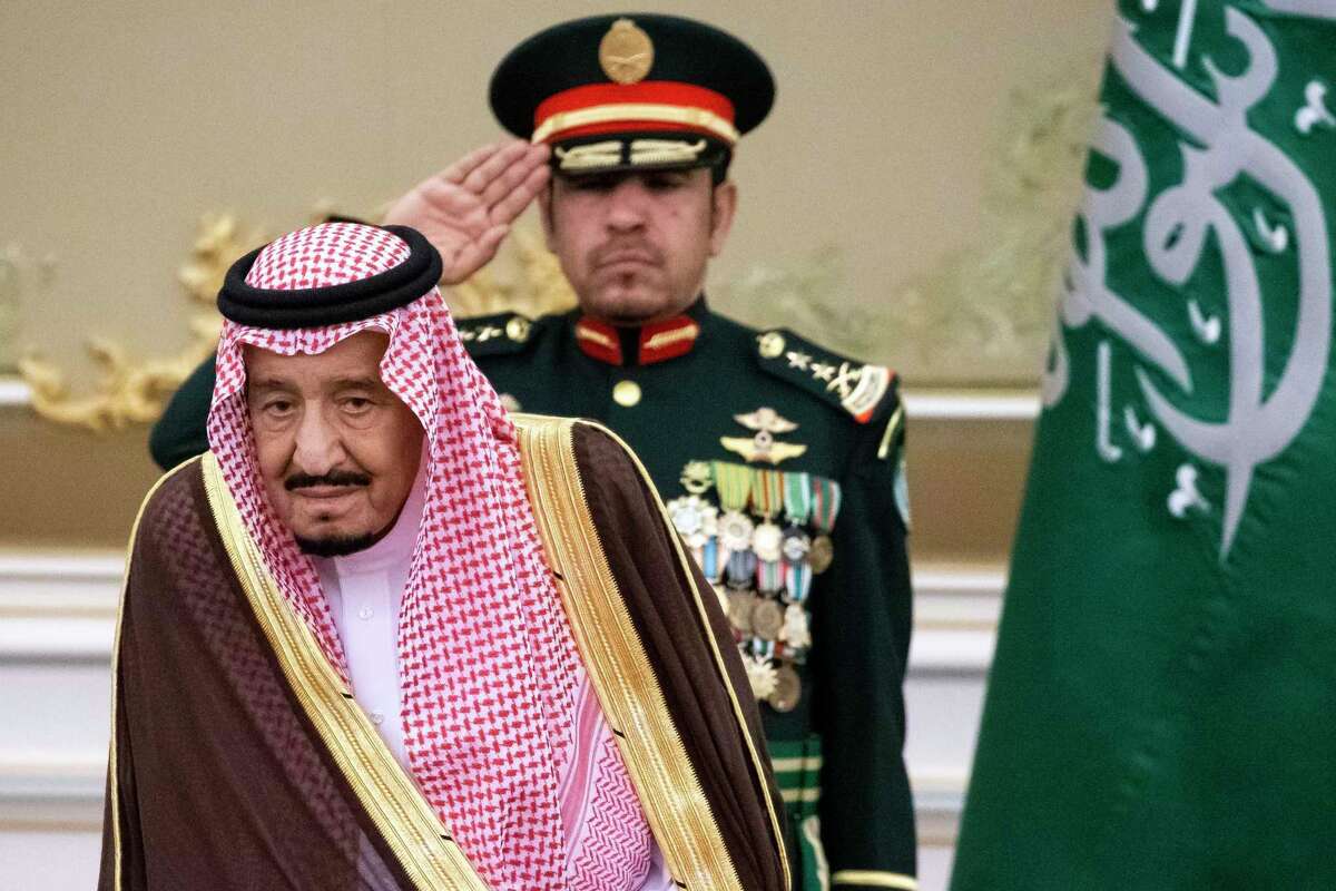 In this Oct. 14, 2019, photo, Saudi Arabia's King Salman attends the official welcome ceremony for Russian President Vladimir Putin in Riyadh, Saudi Arabia.
