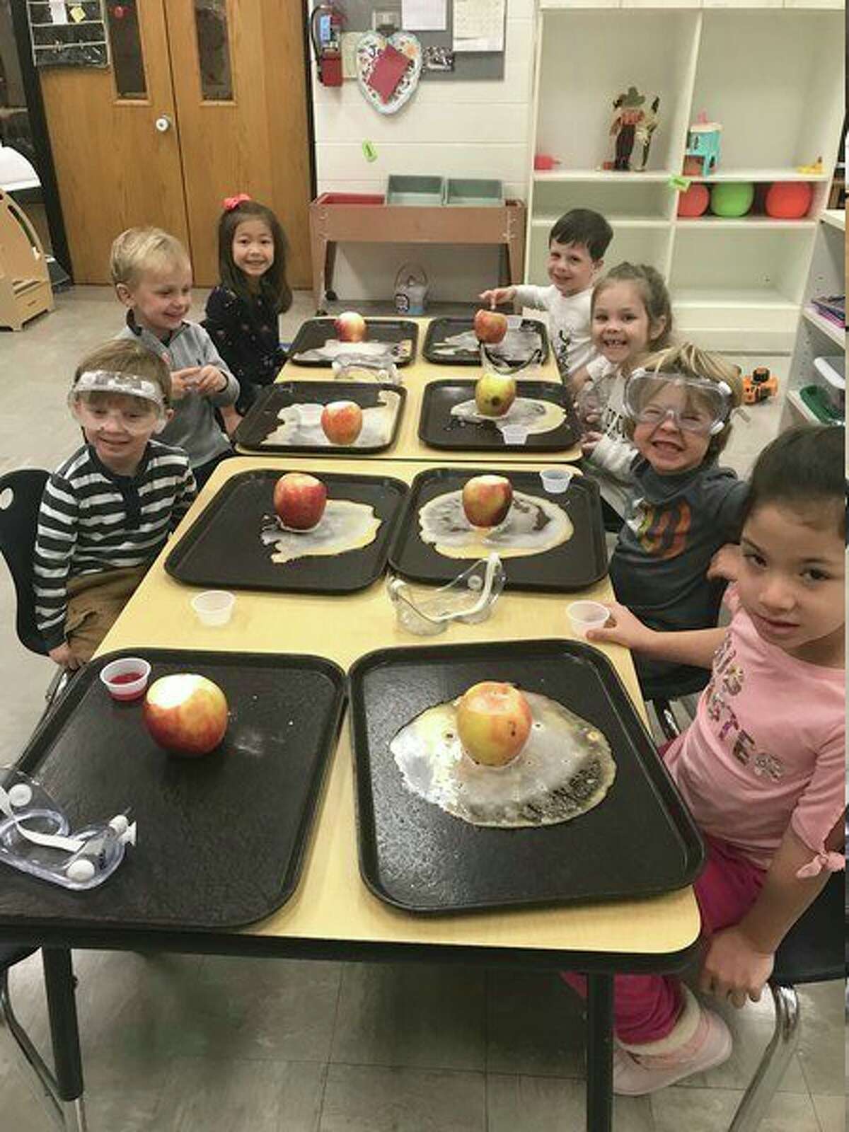 Students were all smiles as they proudly show off their apple volcanoes.