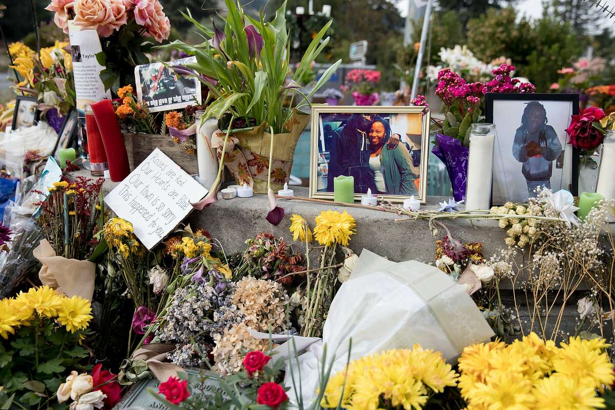 A makeshift memorial is seen in downtown Orinda, Calif. Wednesday, Nov. 13, 2019 after five were killed during a Halloween house party.