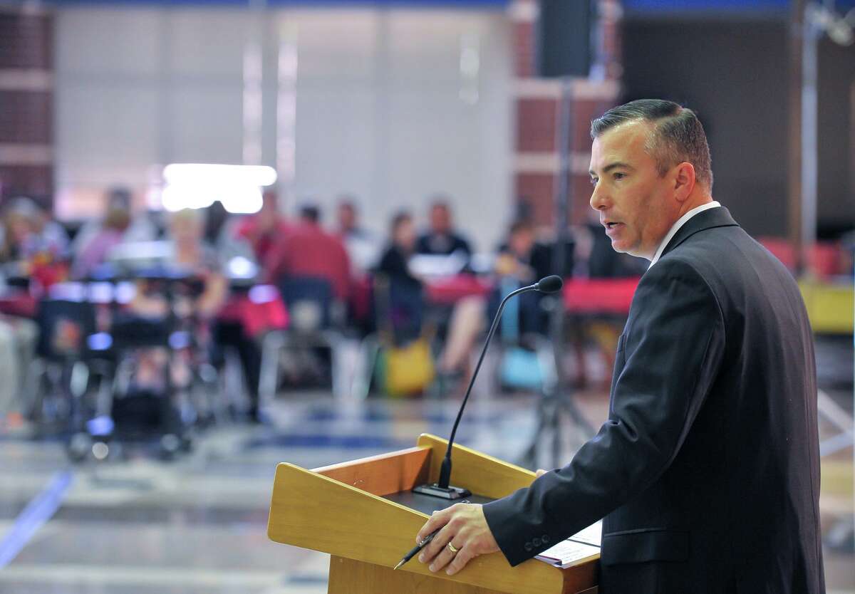 Northside ISD Superintendent Brian Woods speaks to first year teachers during an orientation luncheon at Stevens High School in 2014.