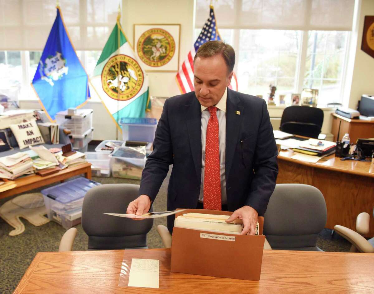 Greenwich First Selectman Peter Tesei cleans out his office at Town Hall in Greenwich, Conn. Tuesday, Nov. 19, 2019. Tesei was elected as First Selectman in 2007 and has enjoyed six terms as Greenwich's top elected official. State Rep. Fred Camillo, R-Greenwich, will succeed Tesei on Dec. 1.