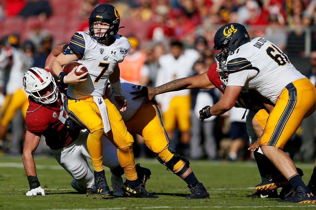 California Golden Bears quarterback Chase Garbers (7) scrambles out of the pocket for a gain in the first half of the 122nd Big Game against the Stanford Cardinal at Stanford Stadium on Saturday, Nov. 23, 2019, in Stanford, Calif.