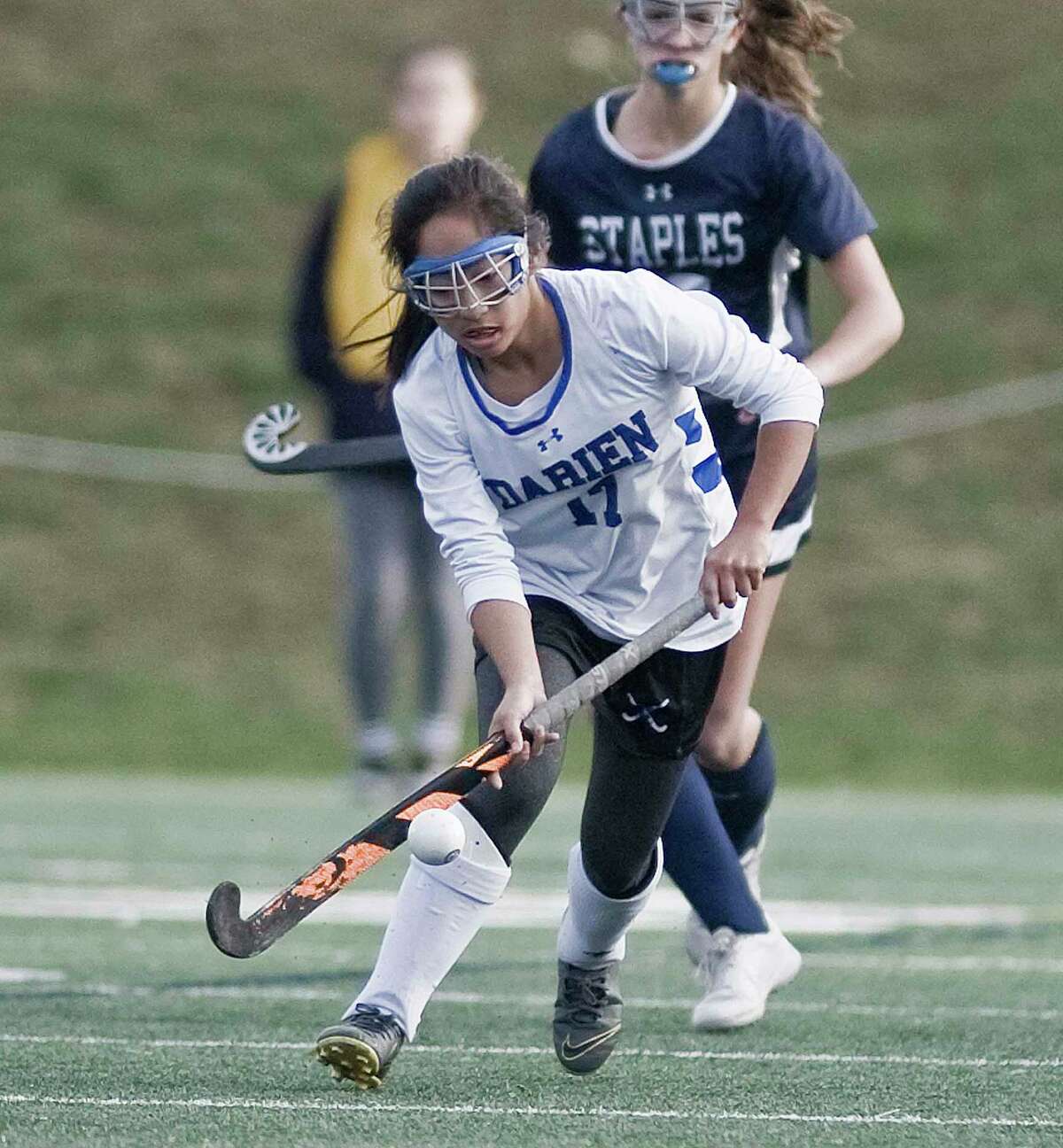 Darien High School's Tala Garcia gains control of the ball up the field in the Class L state field hockey championship game against Staples High School, played at Wethersfield High School. Saturday, Nov. 23, 2019