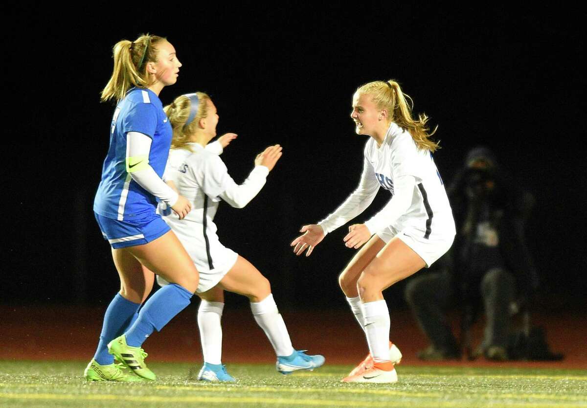 Glastonbury's Samantha Forrest (17), at right, celebrates her second half game winning goal against Southington in a CIAC Class LL Girls Soccer State Championship at Veterans Memorial Stadium on Nov. 23, 2019 in New Britian, Connecticut. Glastonbury won 1-0.