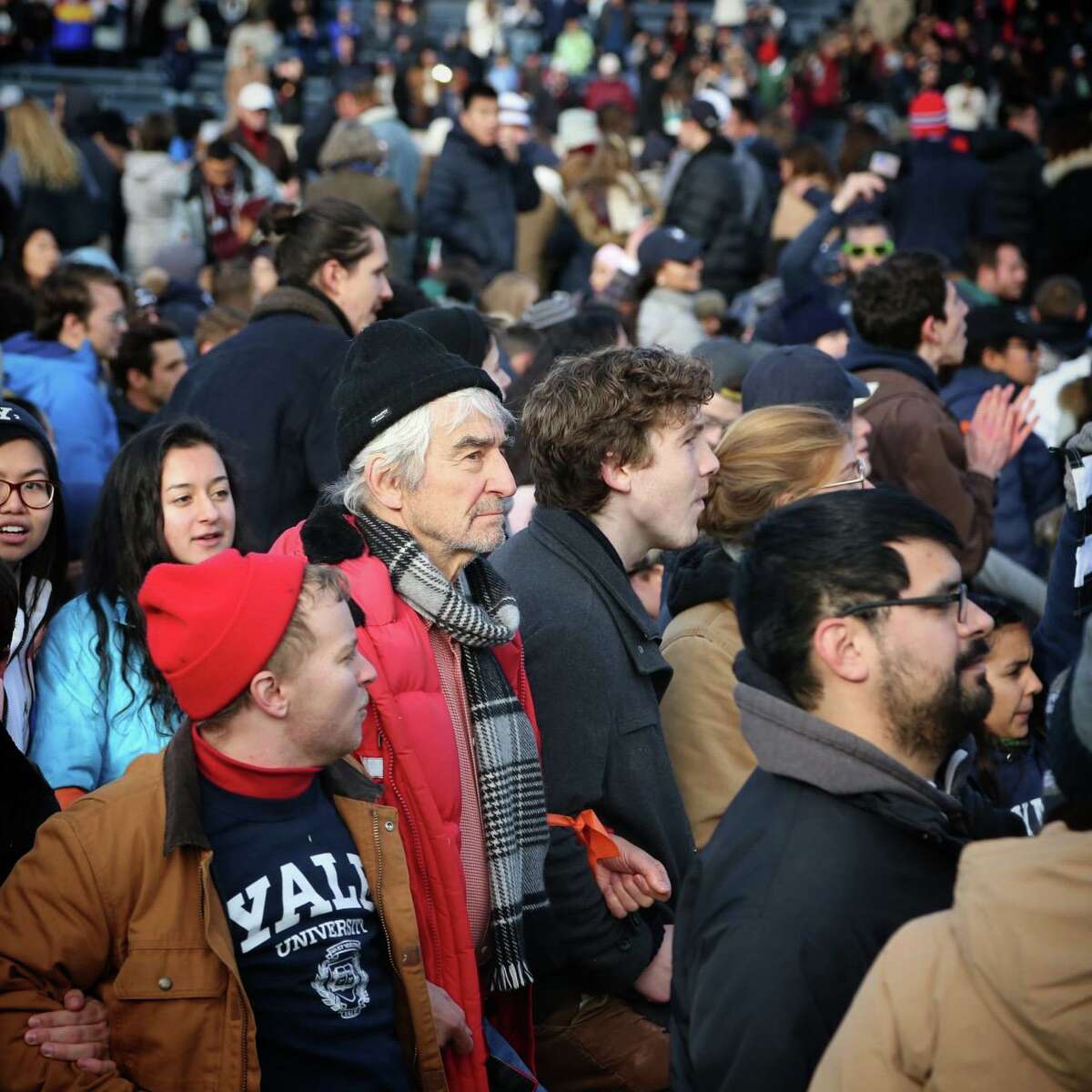 Sam Waterston, center, was among 42 people arrested at the Yale Bowl Saturday in a climate change protest over Yale's and Harvard's endowment holdings in fossil fuel companies.