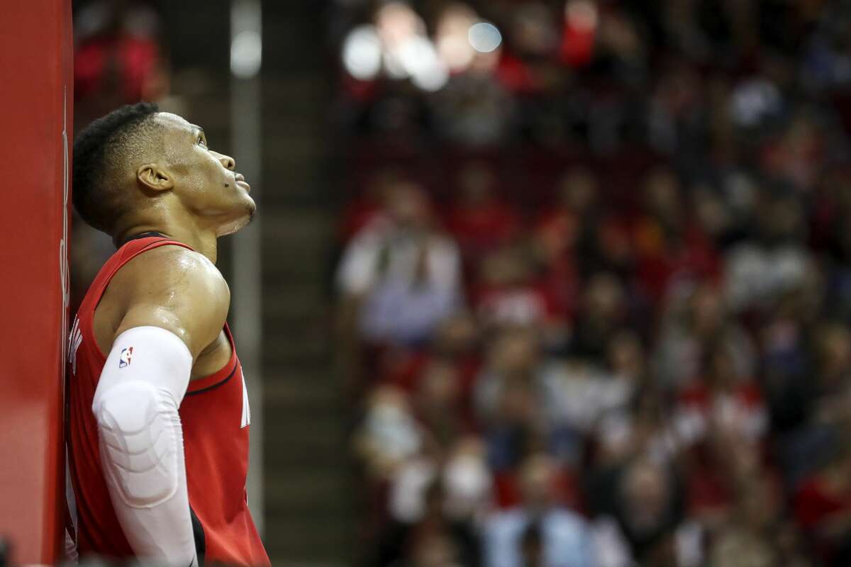 Houston Rockets guard Russell Westbrook (0) watches a replay during the third quarter of an NBA basketball game at the Toyota Center on Sunday, Nov. 24, 2019, in Houston.