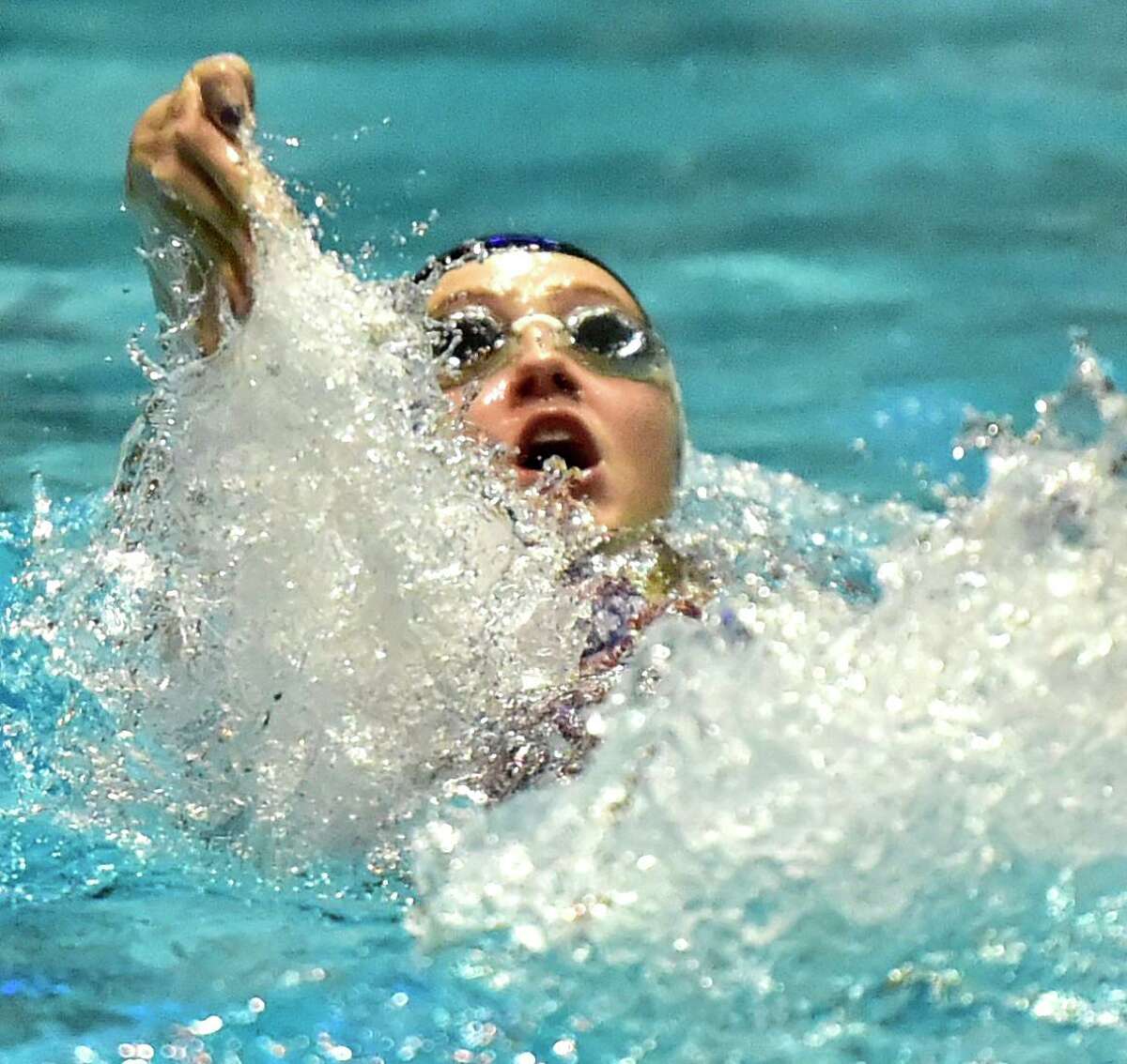 Samantha Ennis of Greenwich High swims the backstroke in the 200 Yard Medley Relay during the CIAC State Open Girls Swimming Championship on Nov. 24 at Yale University in New Haven. Ennis is a senior co-captain.
