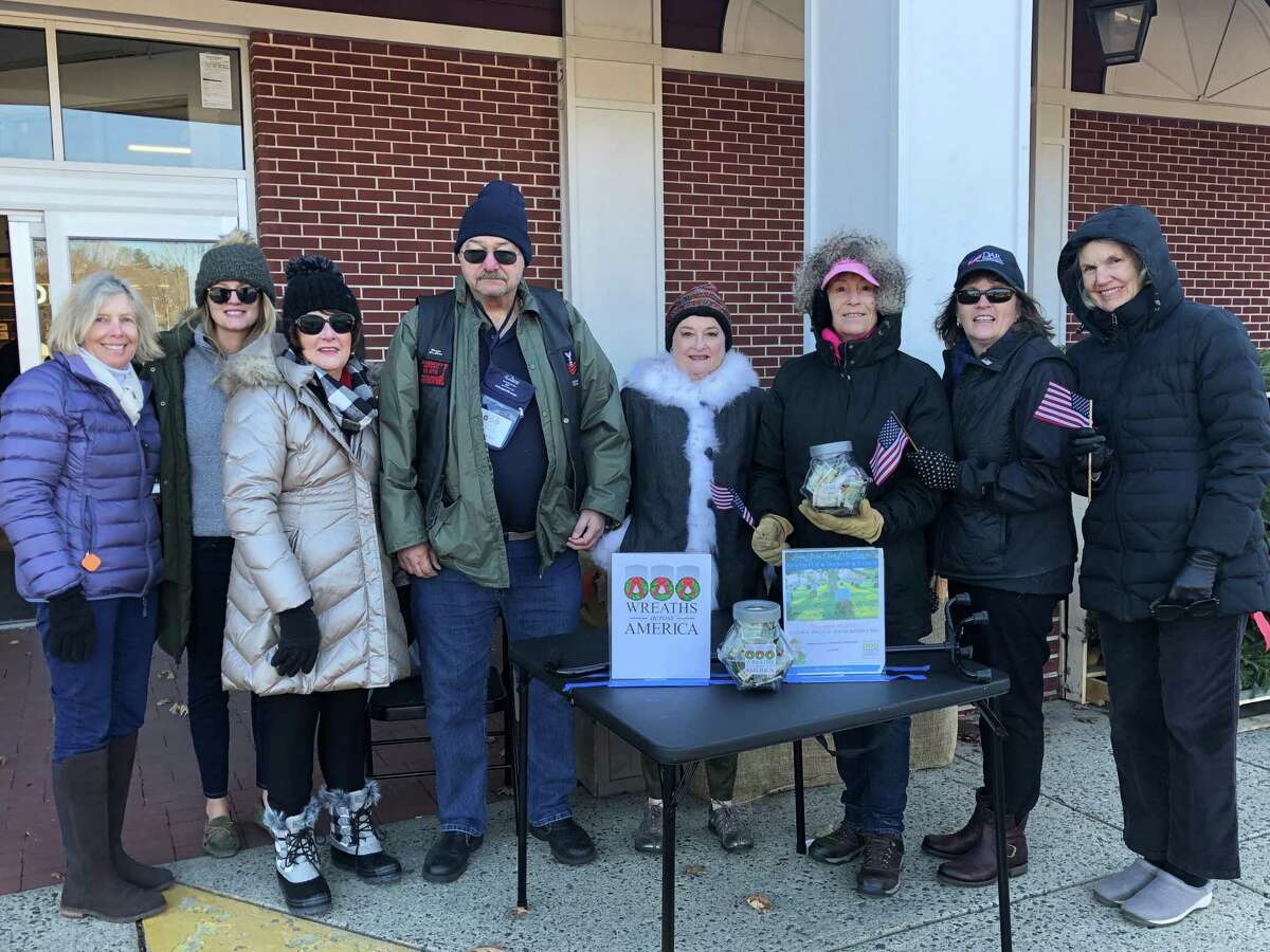 Constitution Week Chairman Rebecca Siciliano, left, Regent Nicole Gorman, Registrar Karen Polett, Donald O'Connell, Patriotic Events Chairman Virginia Otis; Veterans Committee Chairman Carol Wilder-Tamme, CTDAR State Treasurer Katherine Love, with new member Robin Wakeman braved the cold to collect for the wreath laying scheduled this year for noon on Saturday, Dec. 14, at Darien's Spring Grove Veterans Cemetery.
