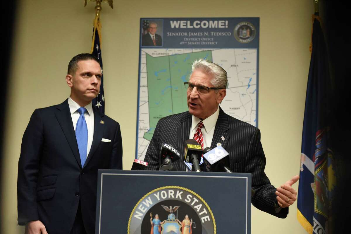 Assemblyman Angelo Santabarbara, left, and Senator James Tedisco, shown speaking at a recent press conference, have proposed surveys and roundtable panels designed to understand and address New York's population losses. (Will Waldron/Times Union)
