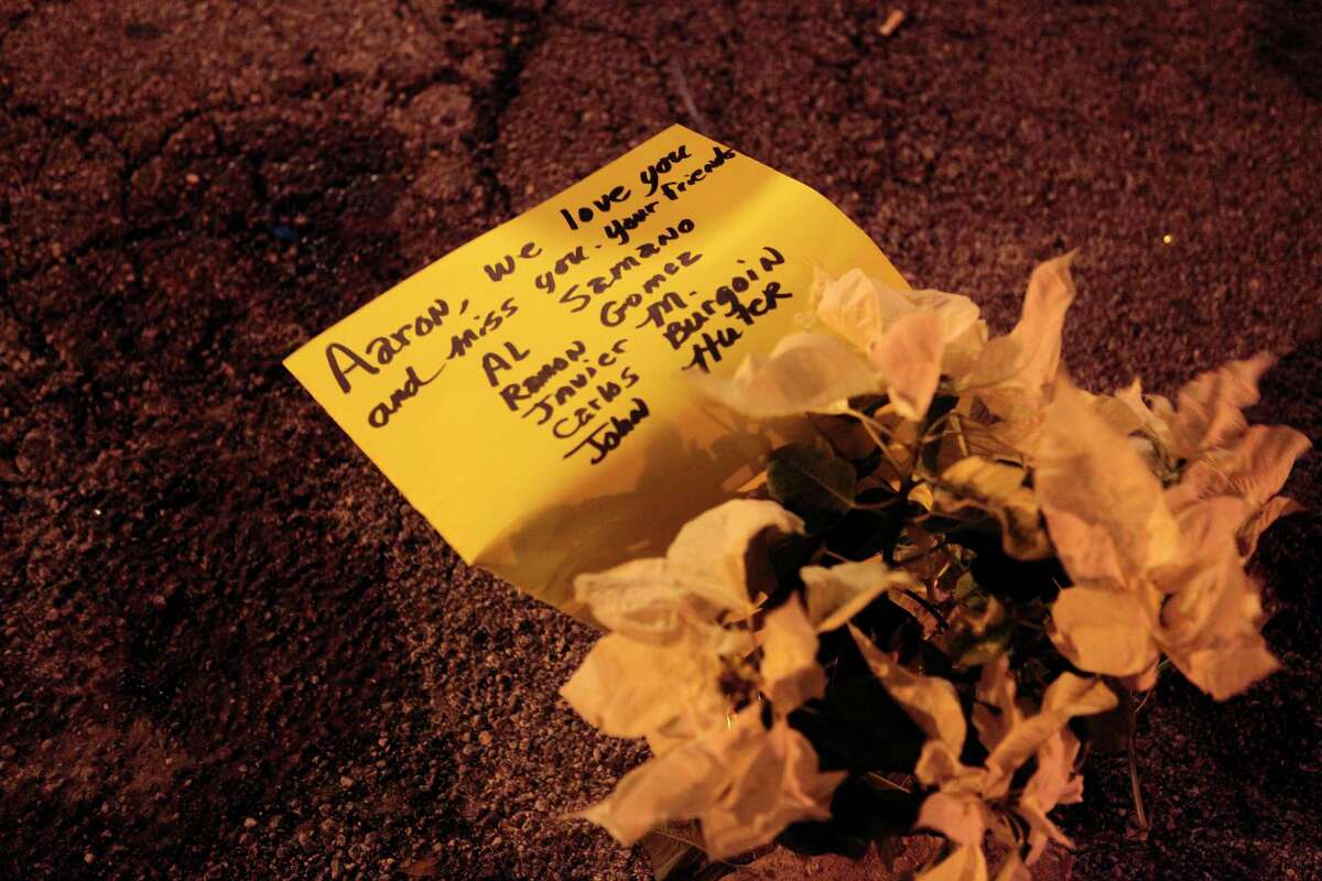 Flowers and a note were set up as a memorial to 28-year-old Aaron Scheerhorn after he was fatally stabbed December 11, 2010 at Club Blur in the Montrose area of Houston, Texas.