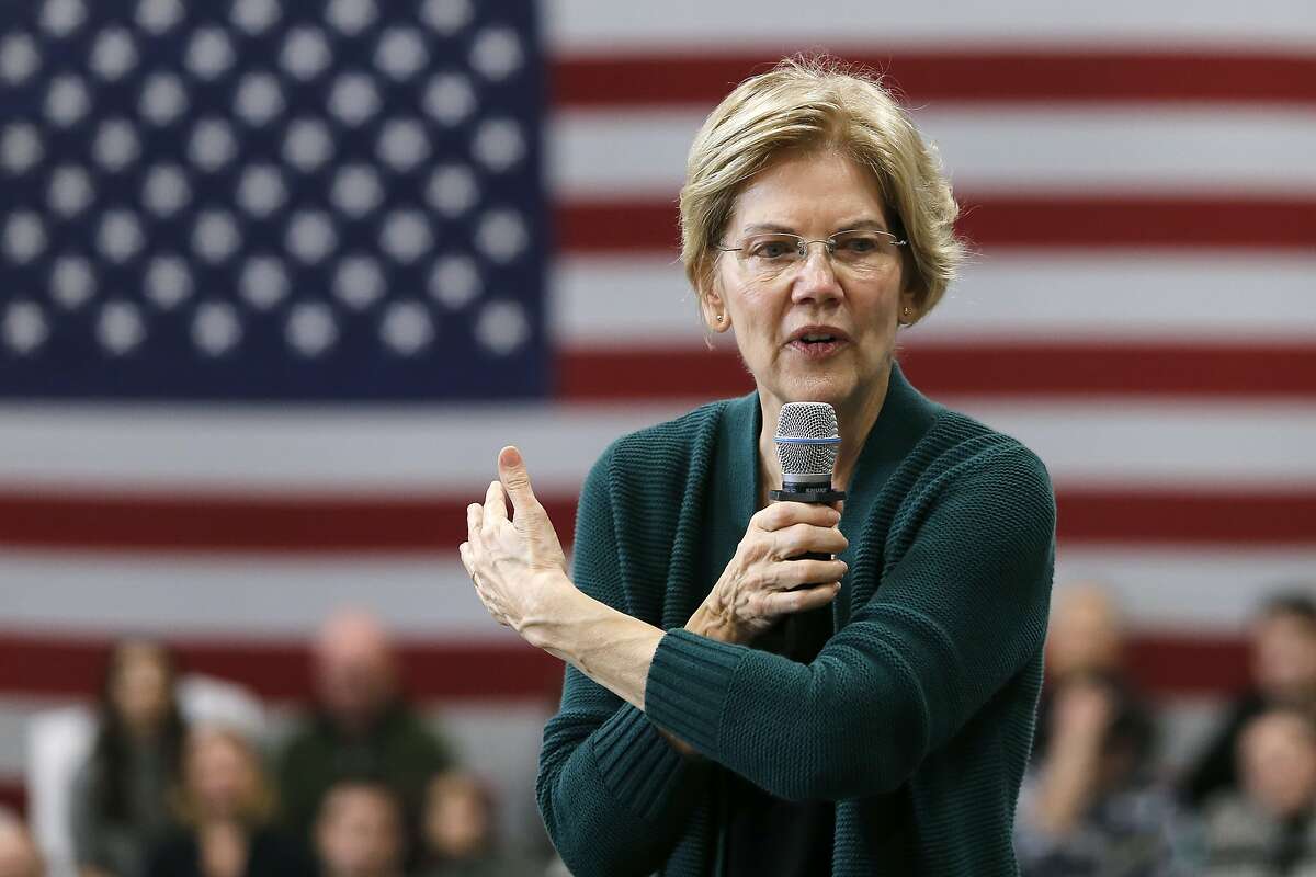Democratic presidential candidate Sen. Elizabeth Warren, D-Mass., gestures as she speaks during a campaign stop, Saturday, Nov. 23, 2019, in Manchester, N.H. (AP Photo/Mary Schwalm)