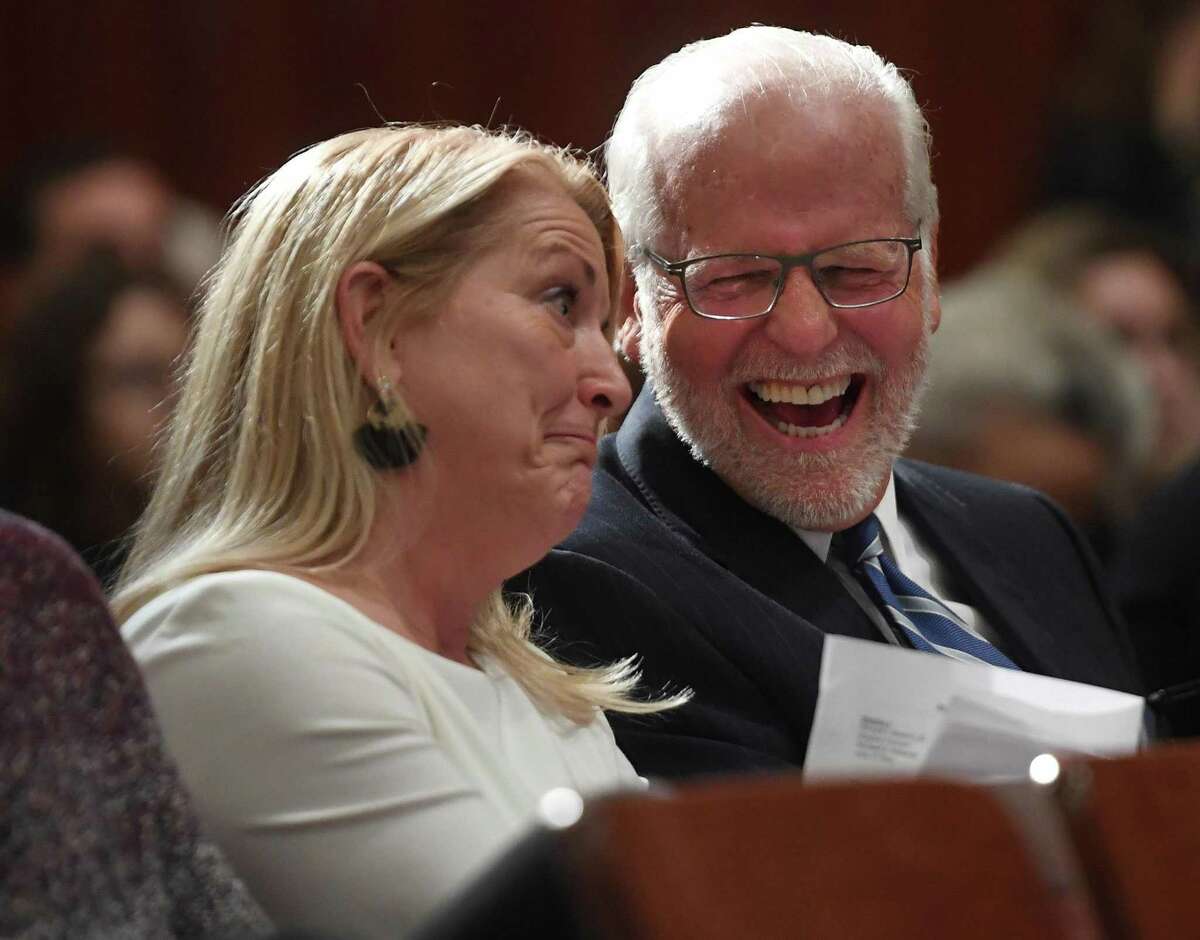 Newly elected Fairfield First Selectwoman Brenda Kupchick, left, has a laugh with former U.S. Rep. Christopher Shays during the Oath of Office Ceremony at Warde High School in Fairfield, Conn. on Monday, November 25, 2019.