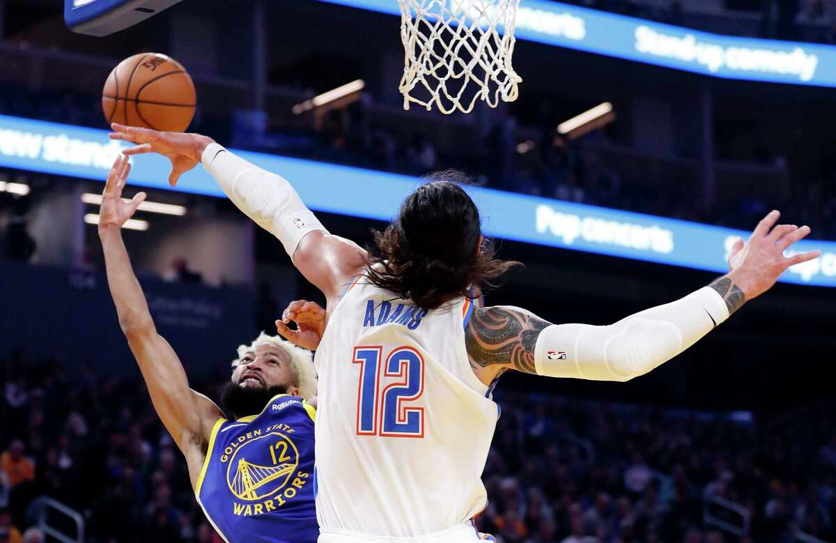 Golden State Warriors' Ky Bowman shoots against Oklahoma City Thunder's Steven Adams in 1st quarter during NBA game at Chase Center in San Francisco, Calif., on Monday, November 25, 2019.