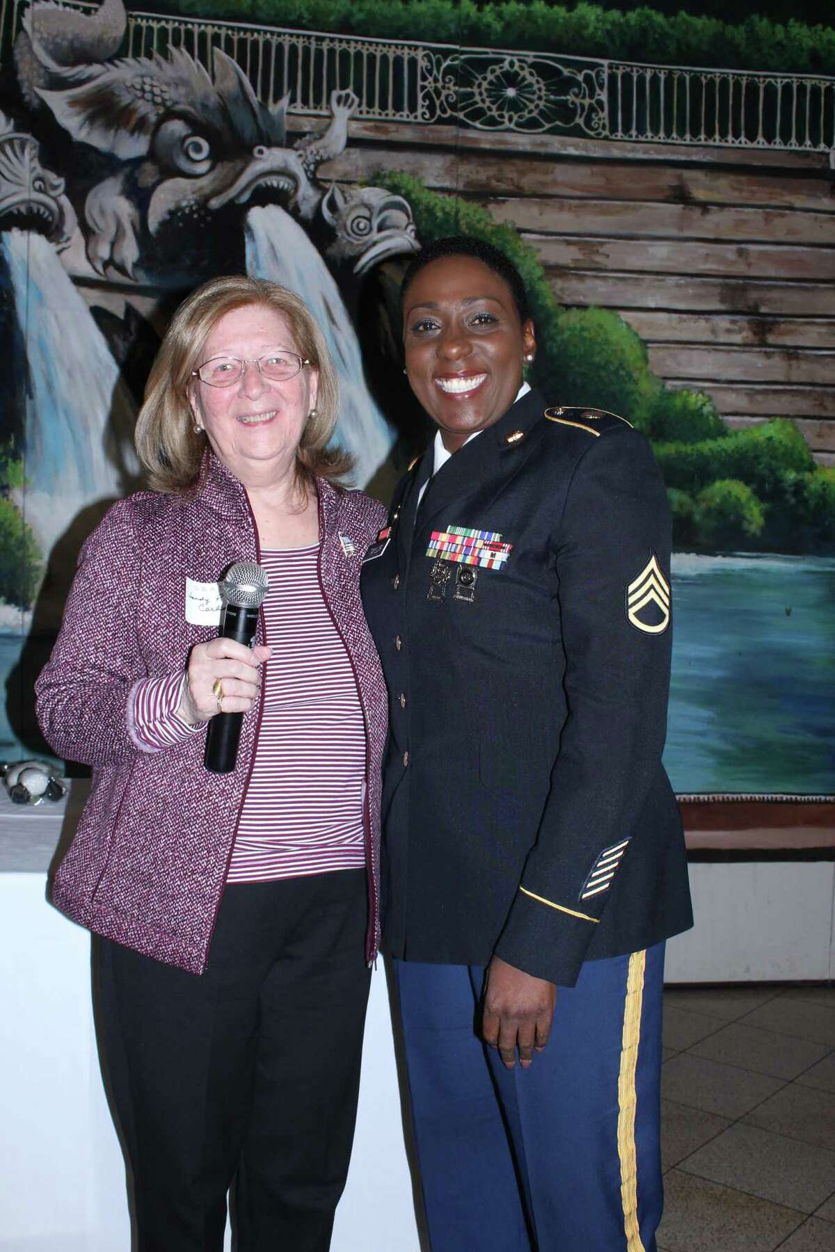 First Vice President Sandra Petrucelli-Carbone of the Greater Bridgeport Retired Teachers Association (GBRTA), introduces the November guest speaker, retired Staff Sergeant Juliet Taylor, at the annual luncheon meeting to honor veterans. The meeting was held at Testo's Restaurant in Bridgeport on Nov. 14.