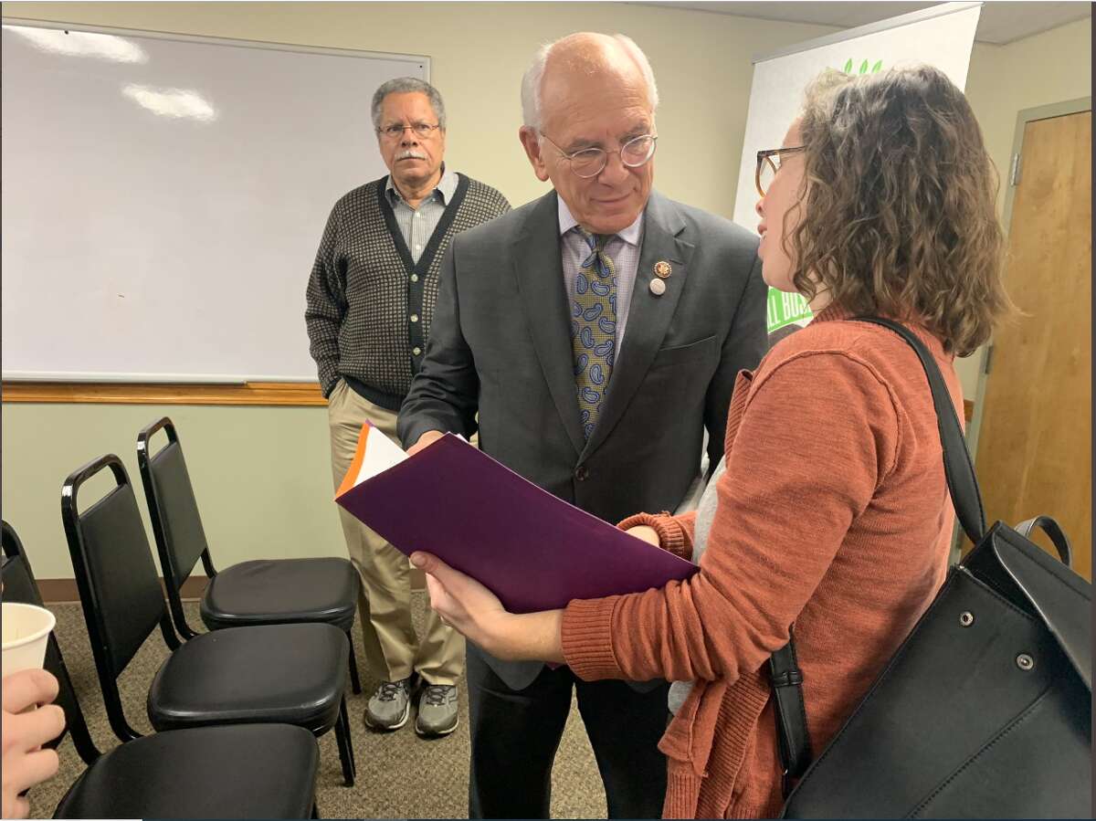 Rep. Paul Tonko meets with Melanie O'Malley, the owner of a small bakery who was affected by the MyPayrollHR fiasco.
