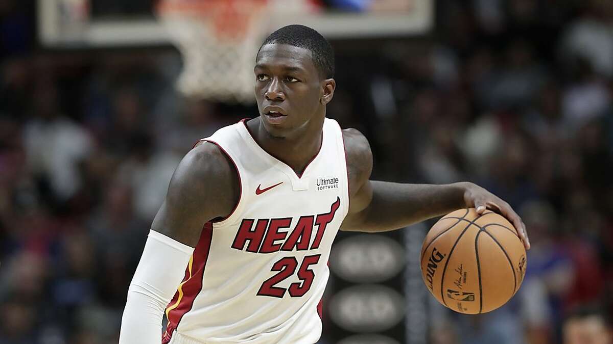 Miami Heat guard Kendrick Nunn (25) brings the ball down the court during the second half of an NBA basketball game against the Charlotte Hornets, Monday, Nov. 25, 2019, in Miami. The Heat won 117-100. (AP Photo/Lynne Sladky)