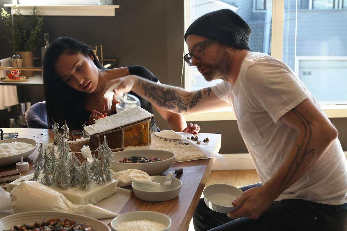 Katherine Altonaga (left) and chef Anthony Strong (right) work on their mid century modern Tahoe vacation lodge on Wednesday, Nov. 20, 2019, in San Francisco, Calif.