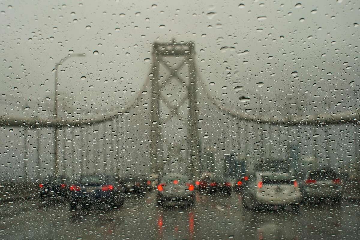 Cars sit in traffic on the Bay Bridge during a rainstorm in San Francisco, California, on Tuesday, Nov. 26, 2019.