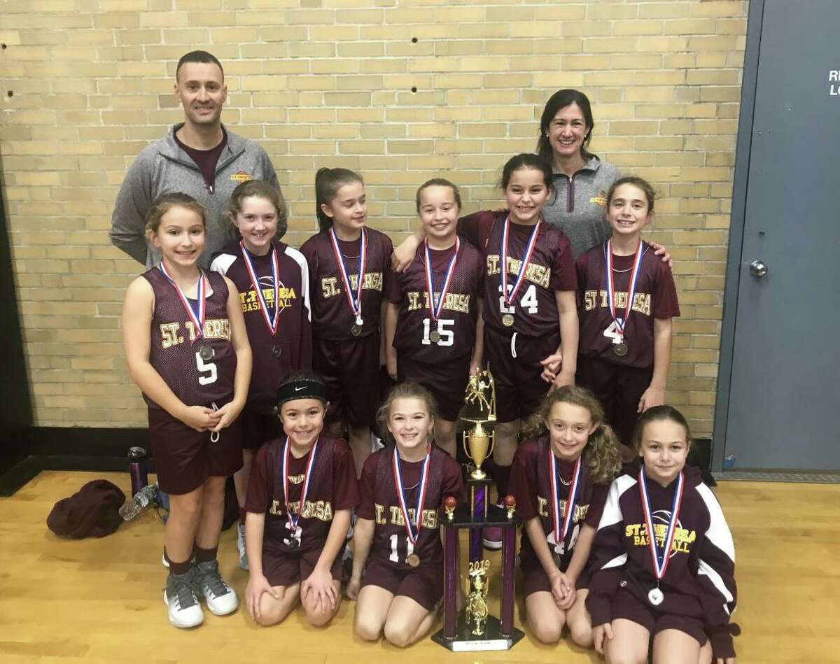 The St. Theresa's Parish 4th grade girls' basketball team won the Milford Knights Tip Off Basketball Tournament Championship. Team members (front row) are: Gianna Colon, Ava Buswell, Ashlyn Delaney and Lia Solustri; (second row) Kelly Lungi, Veronica Buckley, Gianna Holinko, Harper Delaney, Francesca DiMarco and Samantha Russo; (third row) assistant coach Frank DiMarco and head coach Traci Sacco.