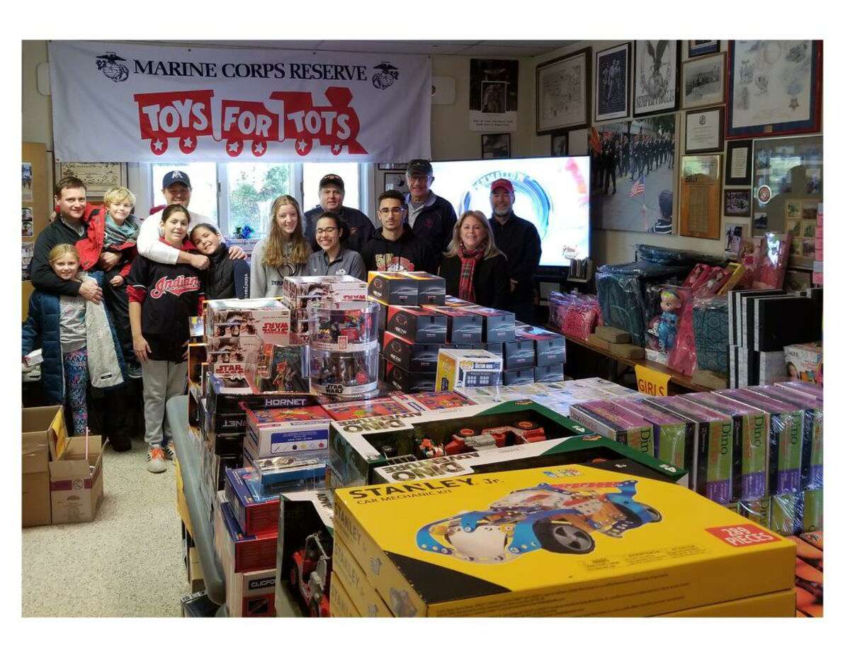 Wilton and Ridgefield members of the Marine Corps League have been collecting and sorting donations to Toys for Tots at the distribution hub in Ridgefield. The annual drive continues until Dec. 15.