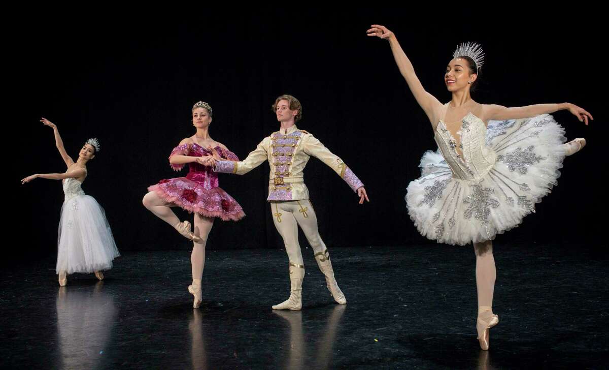 Gretel Batista, from left, Tyler Donatelli, Chandler Dalton and McKhayla Pettingill pose for a photo at the Houston Ballet Center for Dance on Thursday, Nov. 21, 2019, in Houston. The four dancers will have prominent roles in Houston Ballet's "The Nutcracker" for the first time this year.