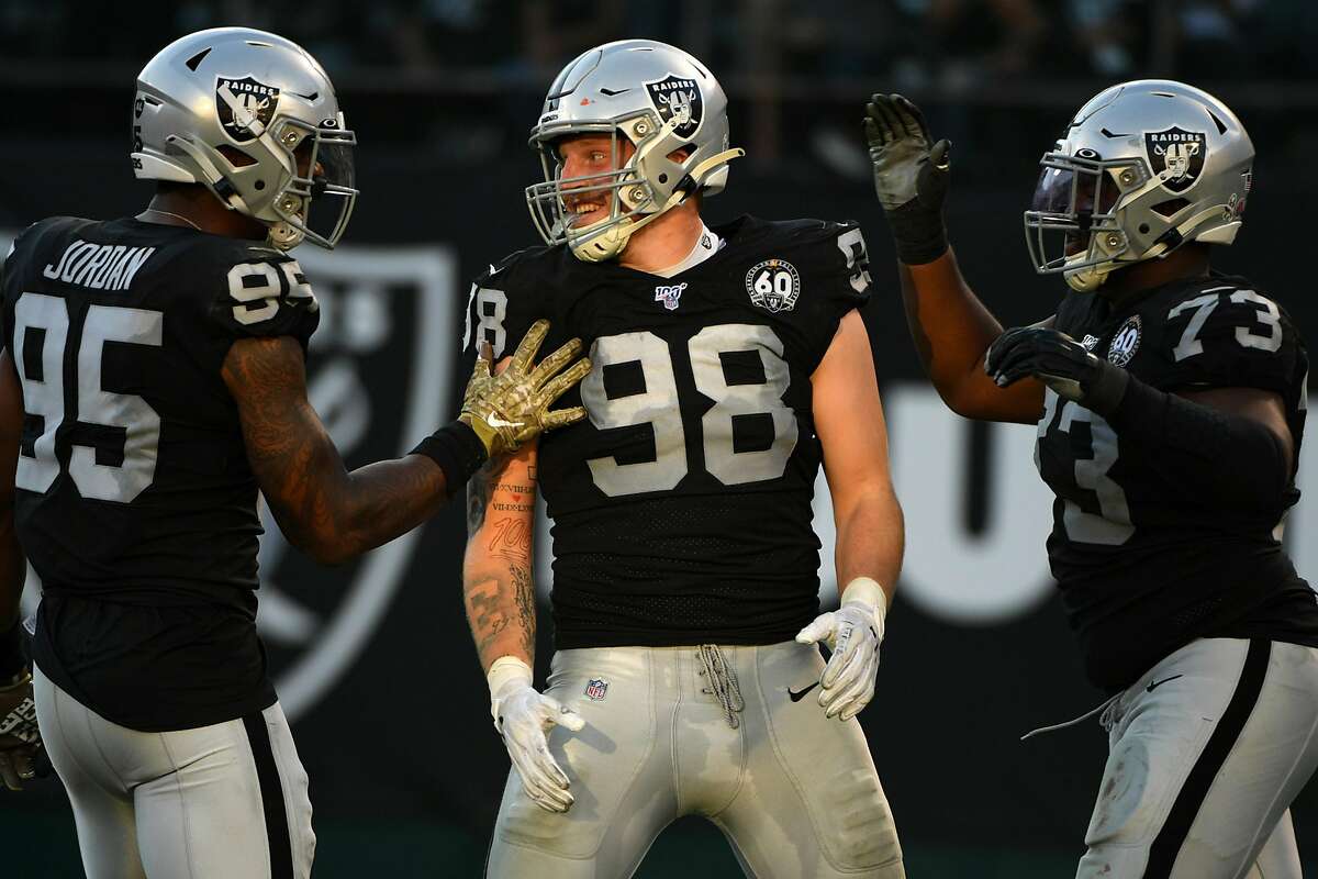 Las Vegas Raiders defensive end Maxx Crosby (98) looks on during