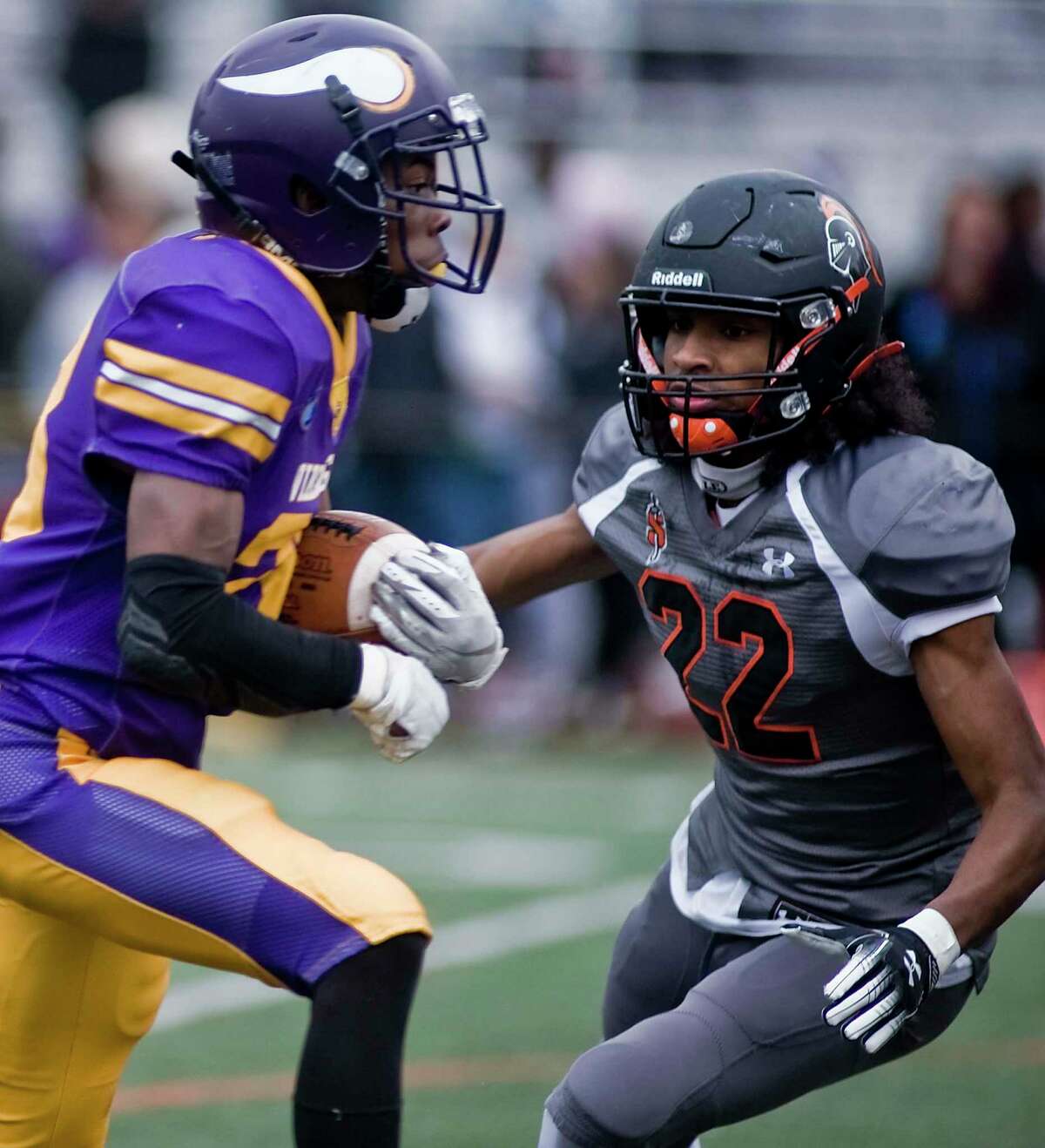 Westhill High School's David Moodie tries to run by Stamford High School's Jordan Chavez in a game played at Westhill. Thursday, Nov. 28, 2019
