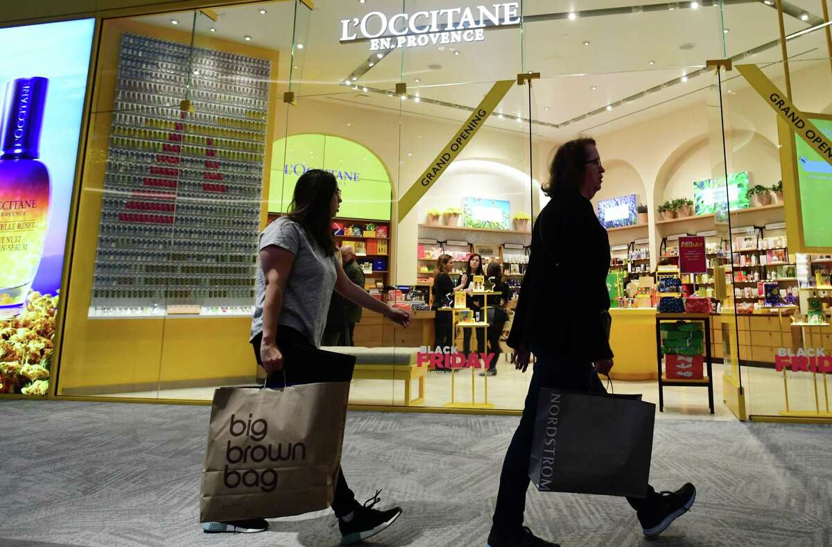 Shoppers search for Black Friday deals at the SoNo Collection mall Friday, November 29, 2019, in Norwalk, Conn.