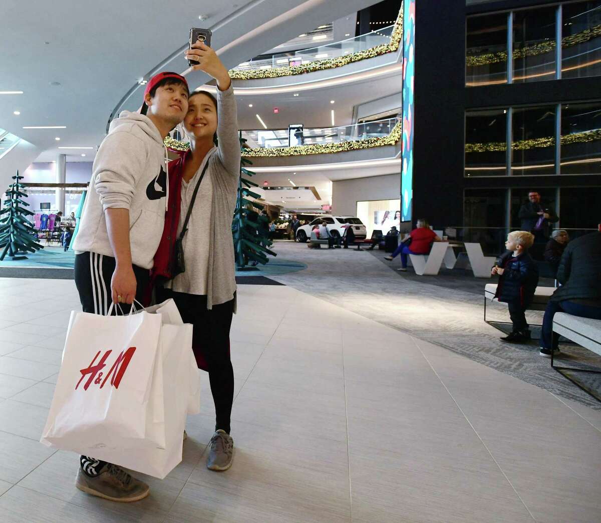 Shoppers search for Black Friday deals at the SoNo Collection mall Friday, November 29, 2019, in Norwalk, Conn.