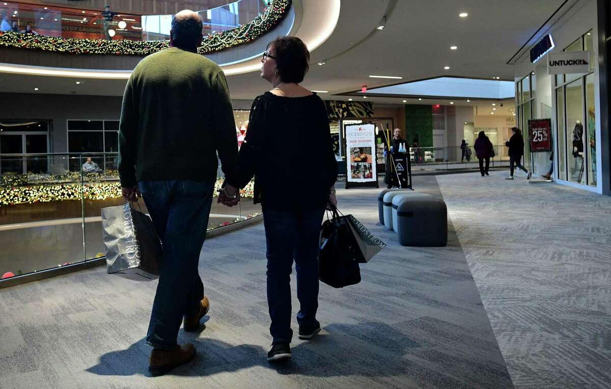 Shoppers search for Black Friday deals at the SoNo Collection mall Friday, November 29, 2019, in Norwalk, Conn.