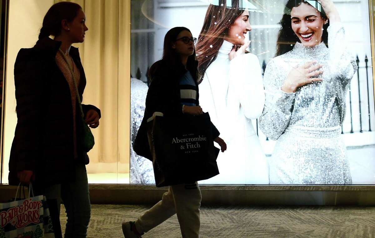 Shoppers search for Black Friday deals at the SoNo Collection mall Friday, November 29, 2019, in Norwalk, Conn.